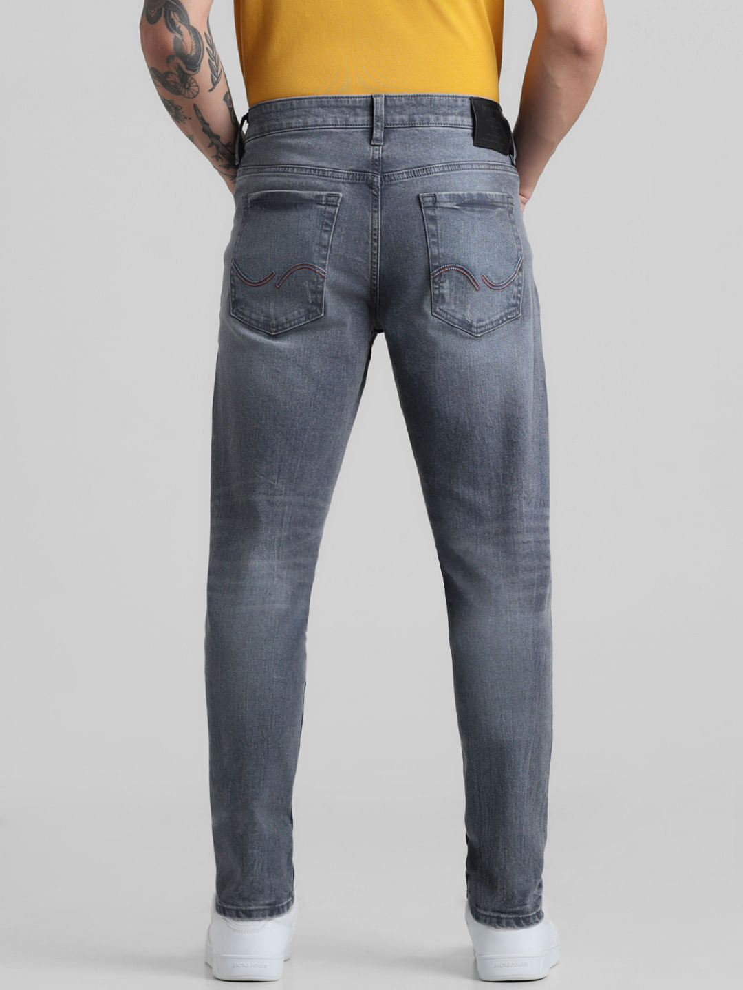 Grey Mid Rise Distressed Slim Jeans