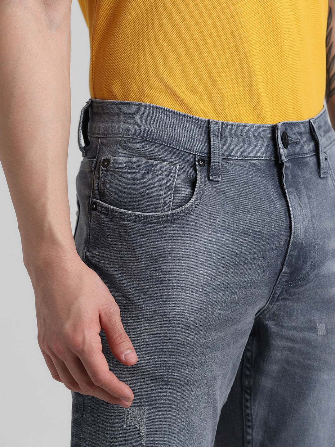 Grey Mid Rise Distressed Slim Jeans