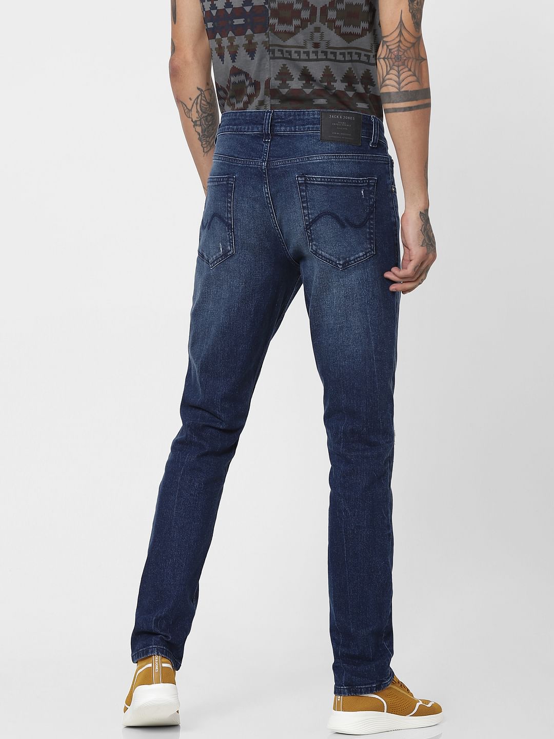Blue Low Rise Glenn Ripped Slim Jeans