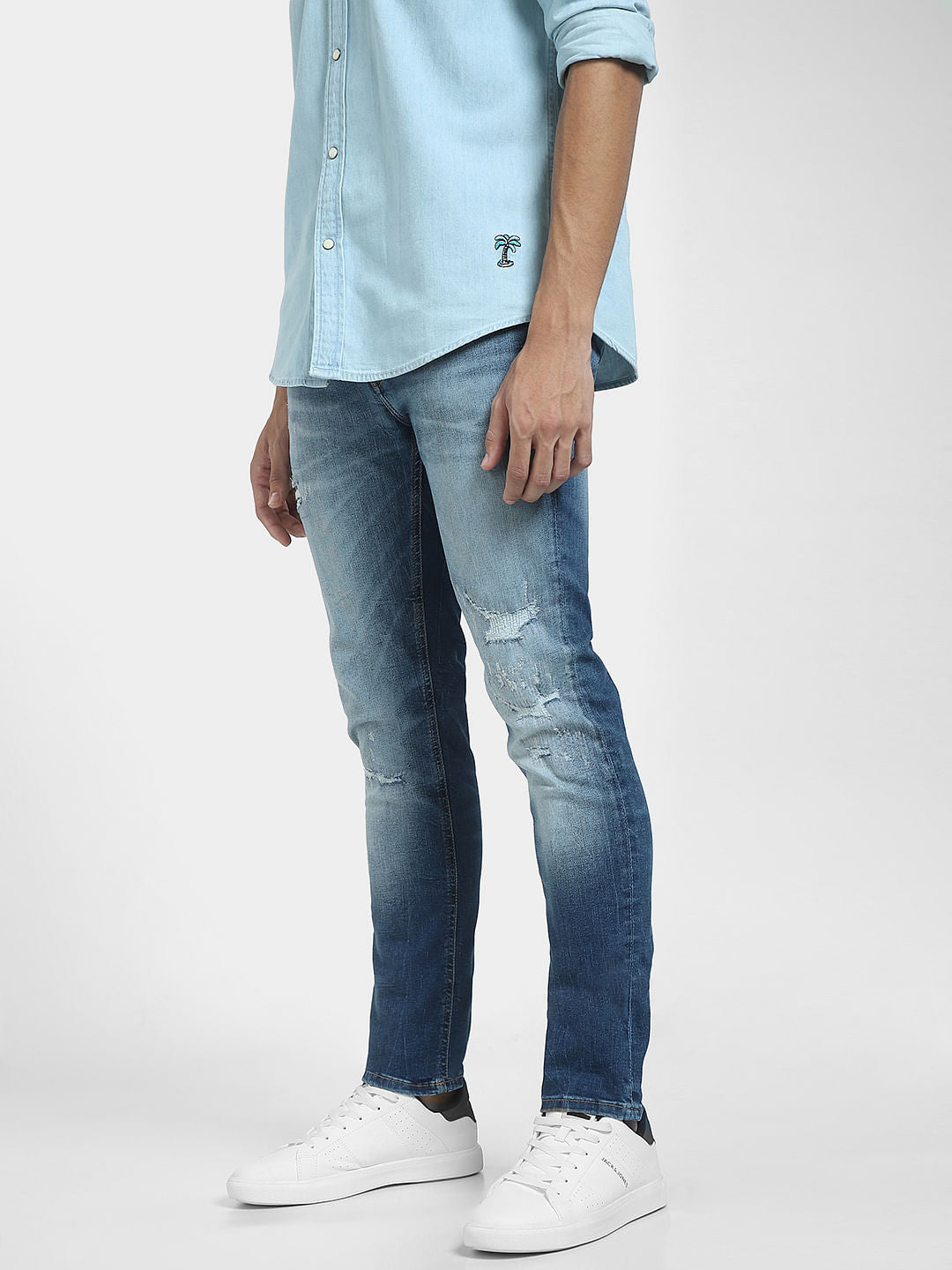 Blue Low Rise Distressed Liam Skinny Jeans