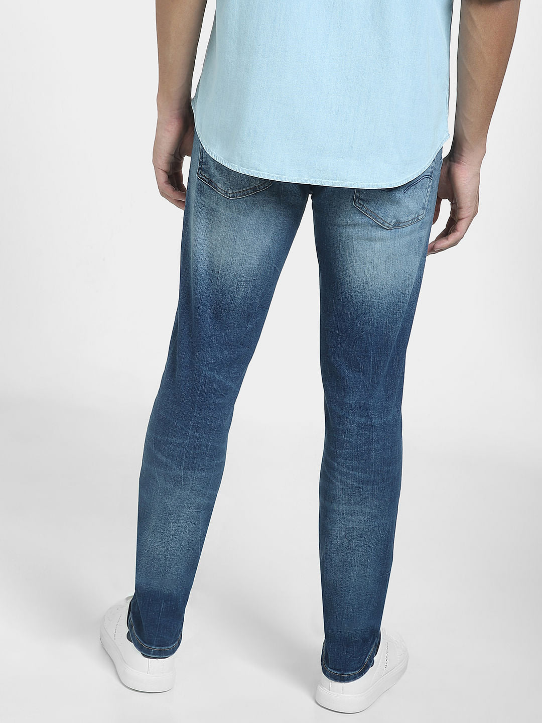Blue Low Rise Distressed Liam Skinny Jeans