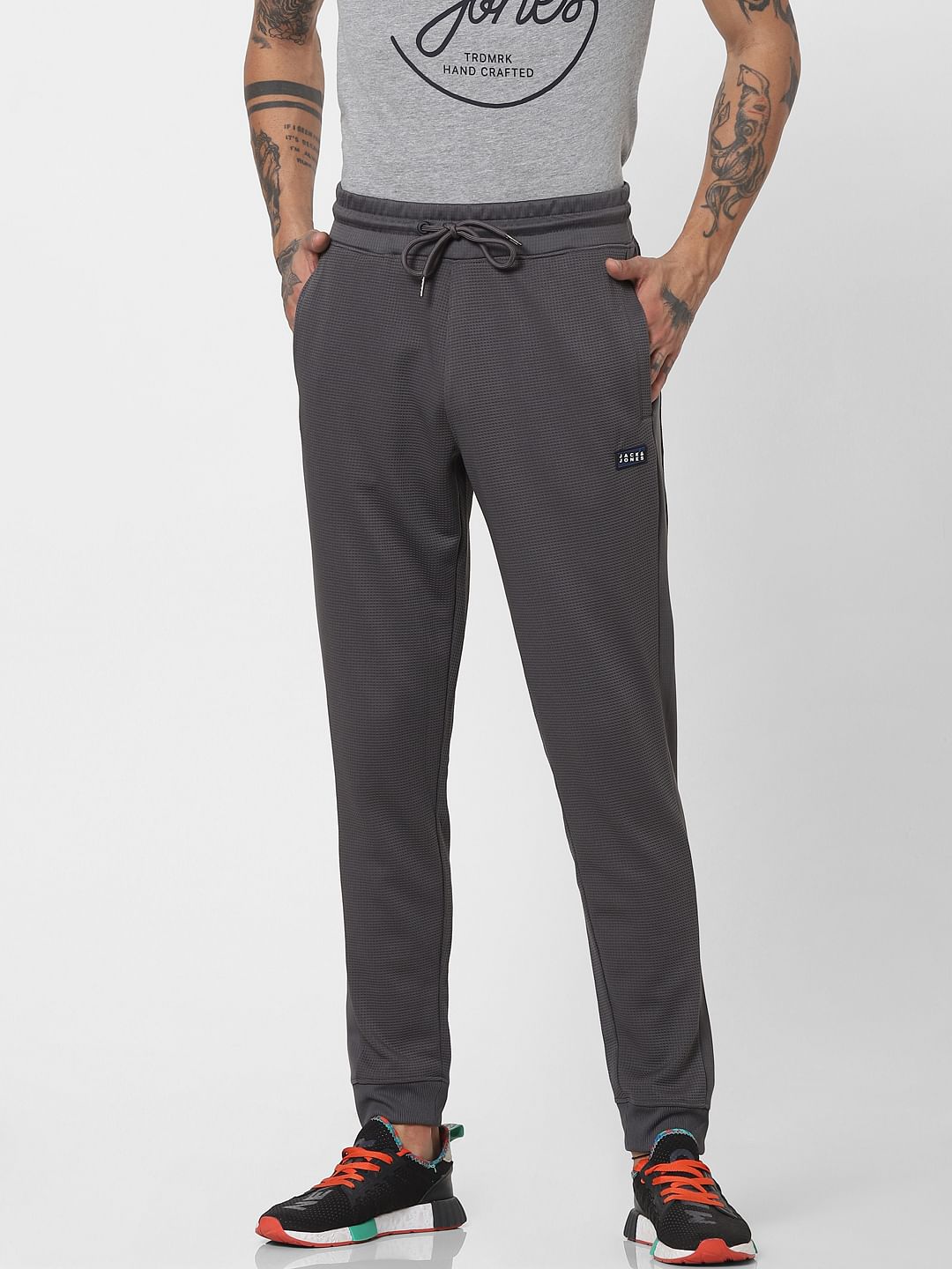 Grey Mid Rise Self Design Sweatpants