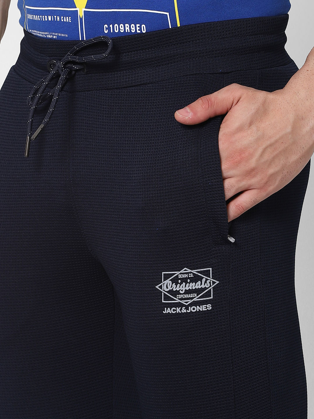 Blue Mid Rise Textured Trackpants