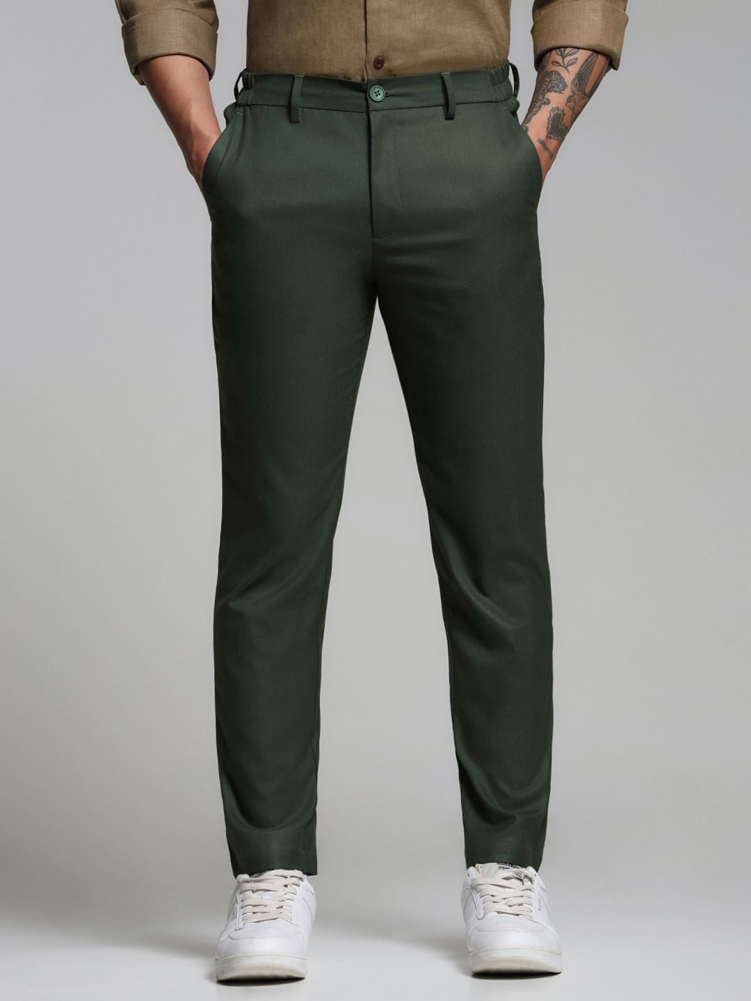 Introducing our Dark Green Mid Rise Slim Fit Pants, the ultimate blend of comfort and style for the modern man. Crafted from a cool mix of 65% Polyester, 33% Viscose, and just Introducing our Dark Green Mid Rise Slim Fit Pants, the ultimate blend of comfort and style for the modern man. Crafted from a cool mix of 65% Polyester, 33% Viscose, and just