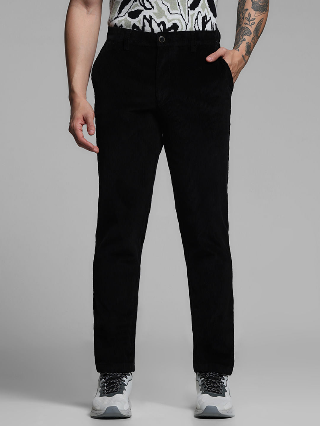 BLACK LOW RISE CORDUROY CHINOS