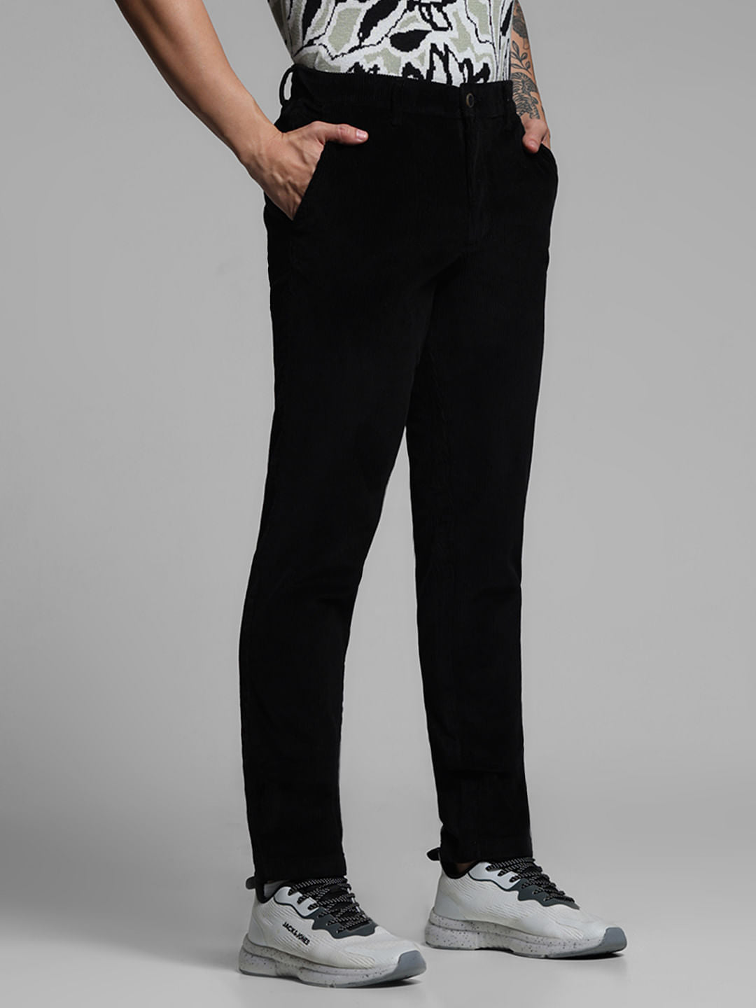 BLACK LOW RISE CORDUROY CHINOS