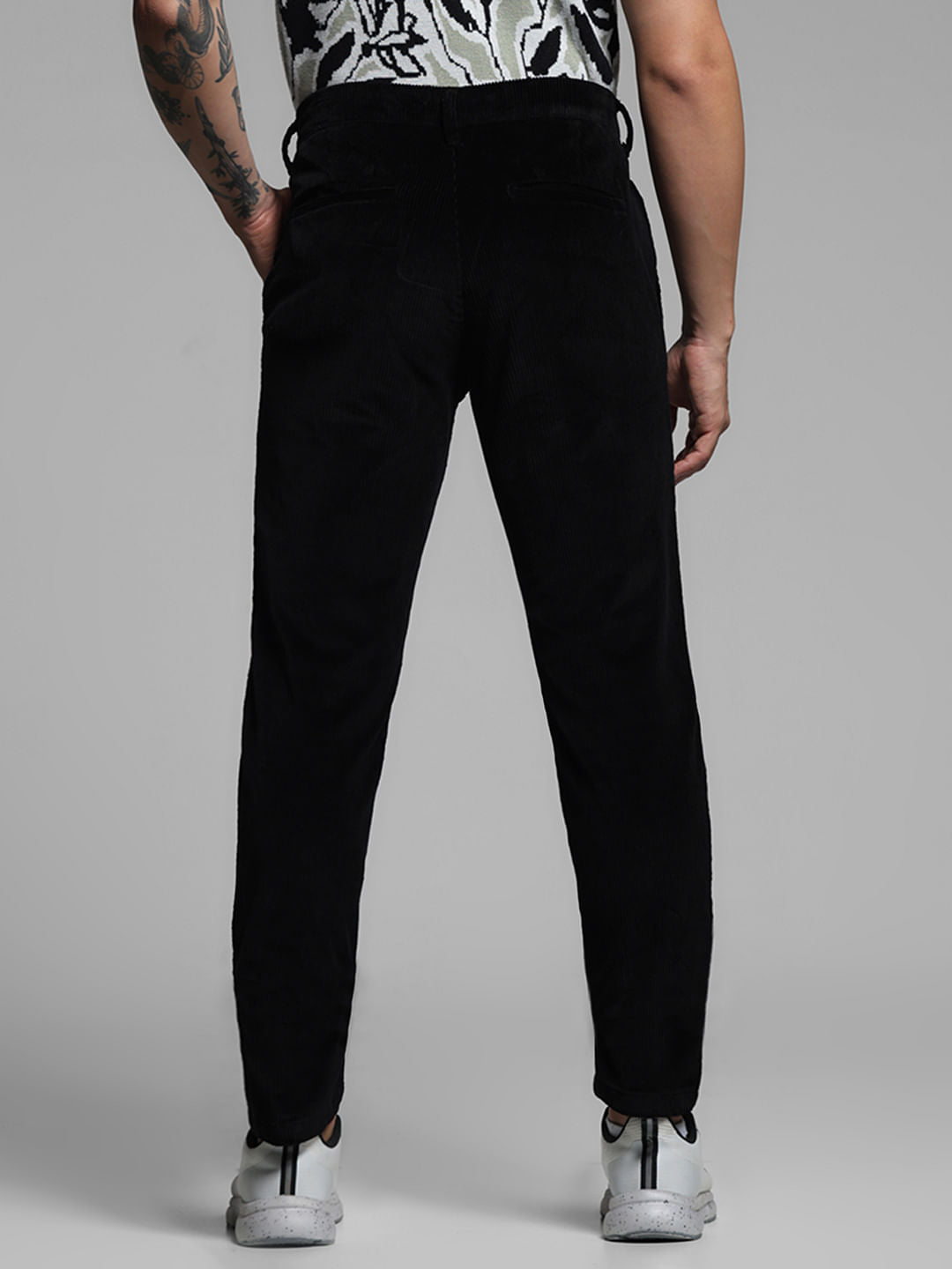 BLACK LOW RISE CORDUROY CHINOS