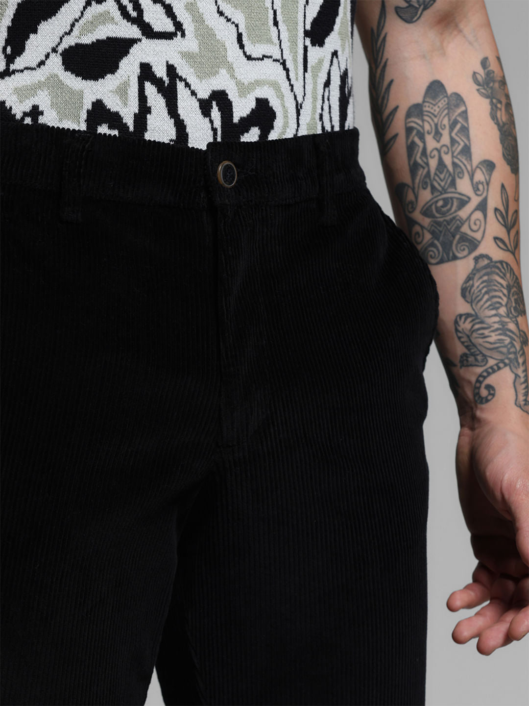 BLACK LOW RISE CORDUROY CHINOS