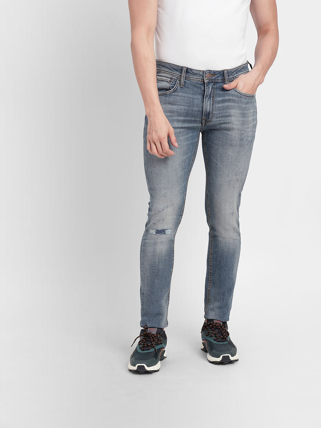 Blue Low Rise Distressed Ben Skinny Jeans
