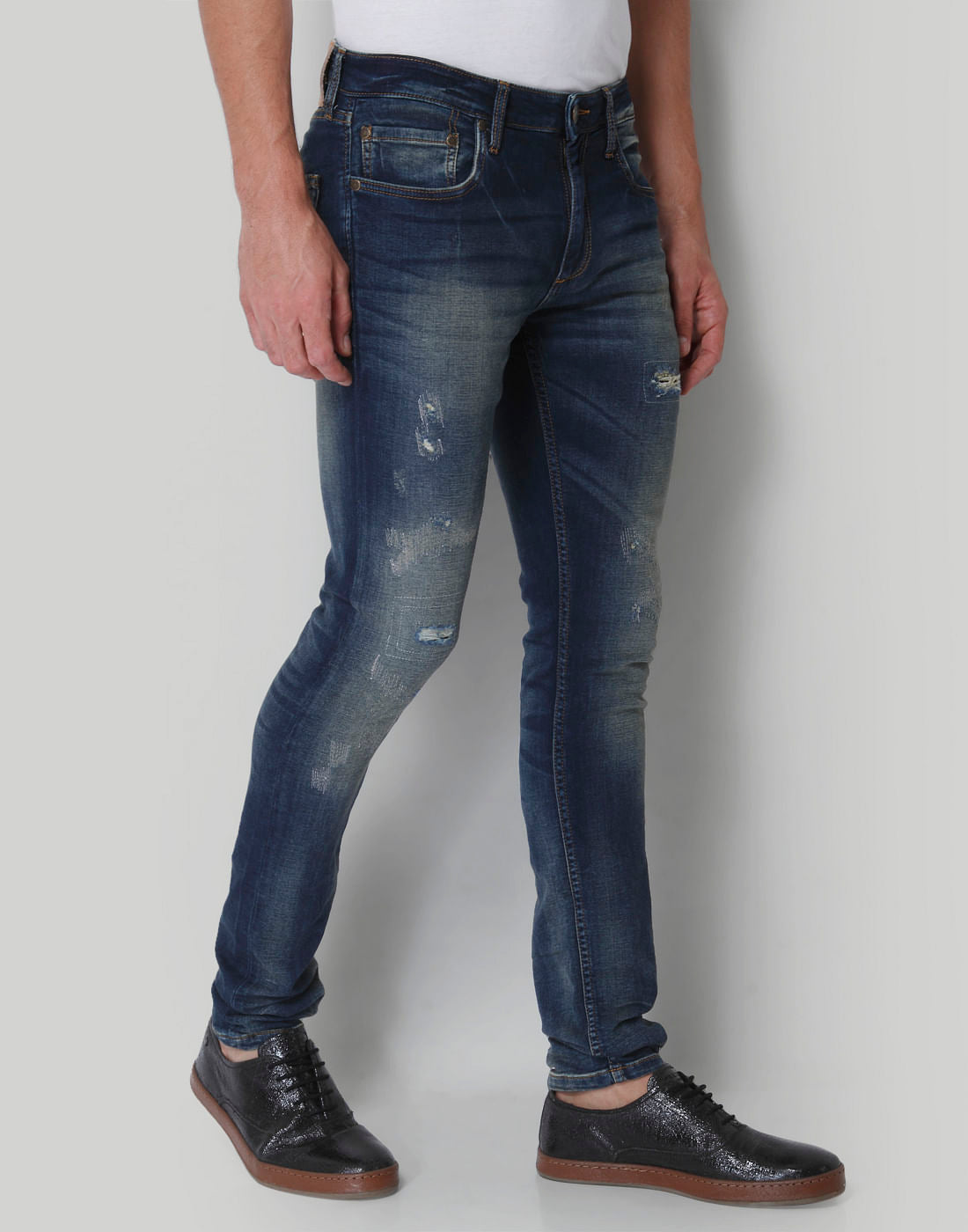 Blue Low Rise Distressed Liam Slim Fit Jeans