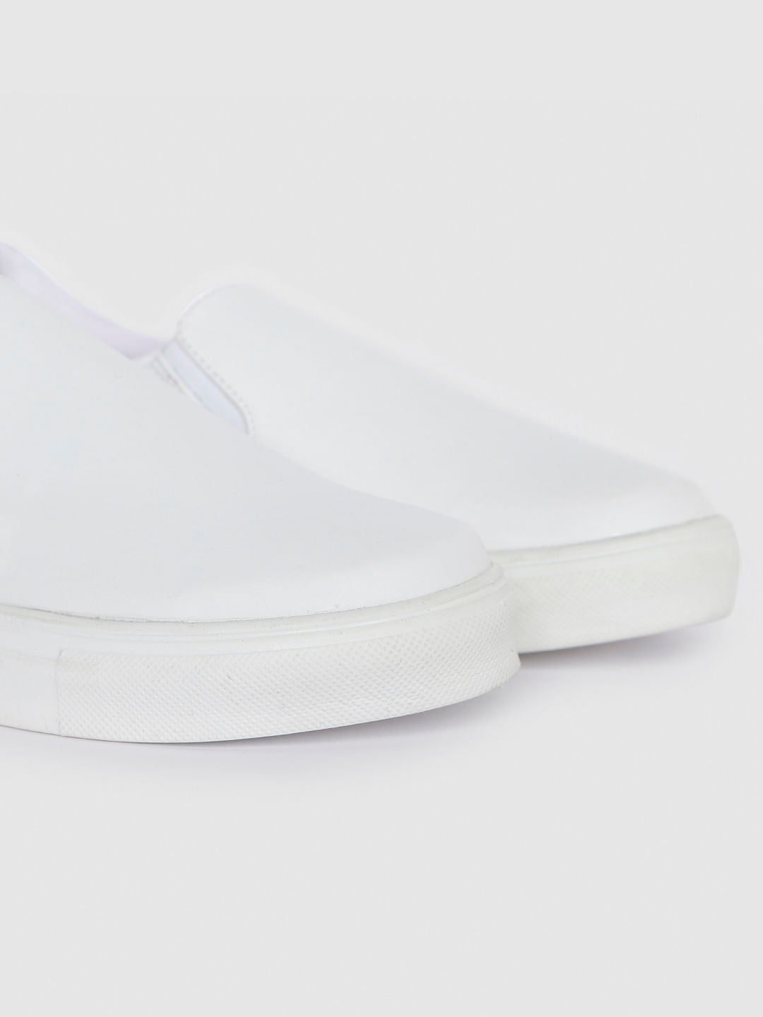 White Slip On Sneakers