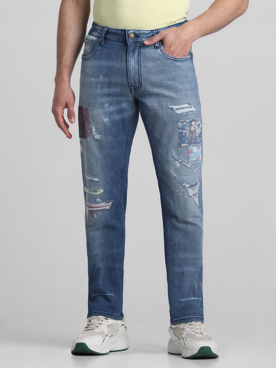 Light Blue Low Rise Distressed Tim Slim Jeans