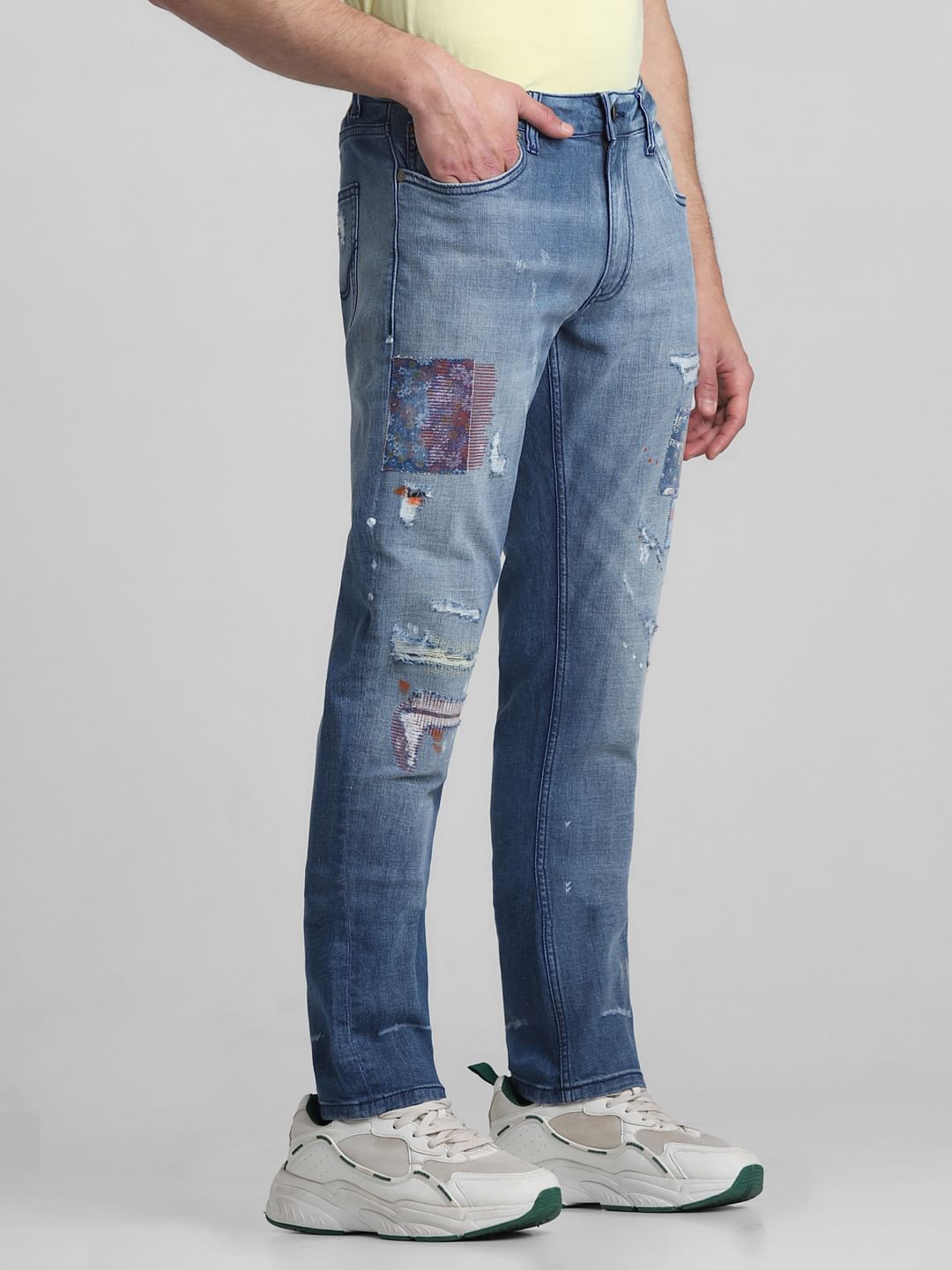 Light Blue Low Rise Distressed Tim Slim Jeans