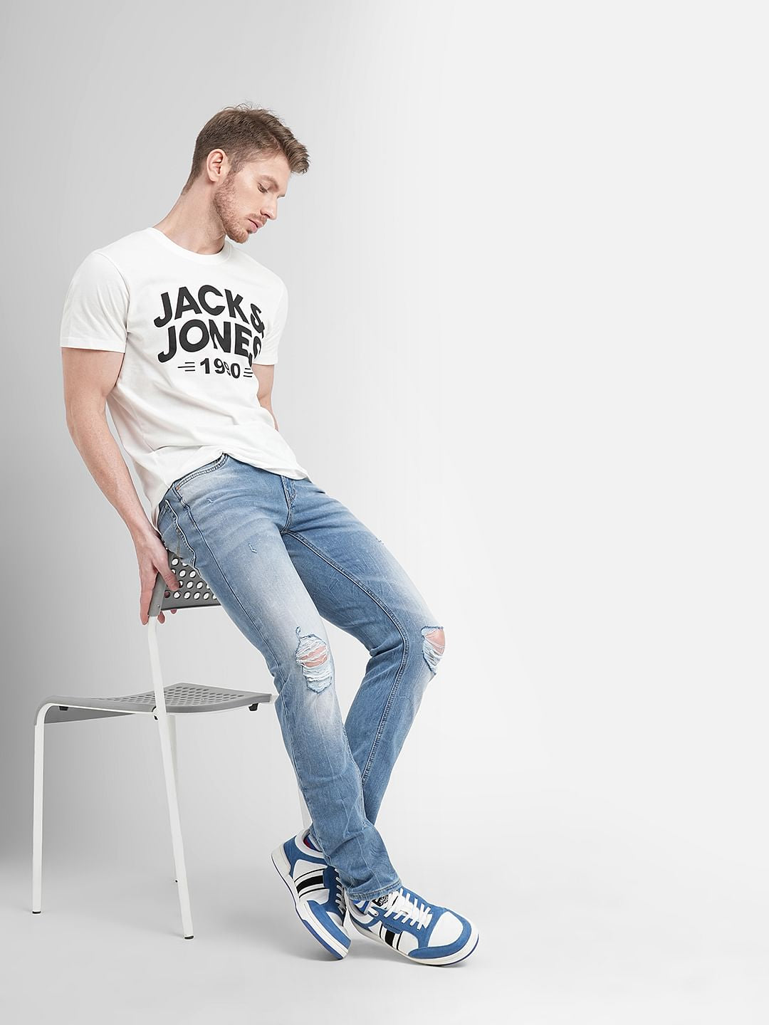 Blue Low Rise Distressed Ben Skinny Fit Jeans