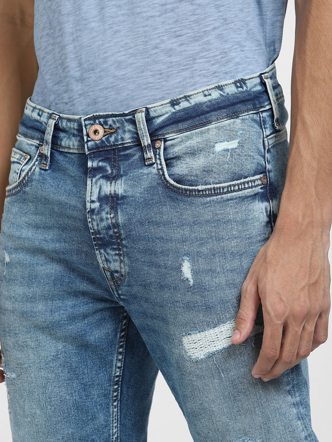 Light Blue Low Rise Distressed Tim Slim Fit Jeans