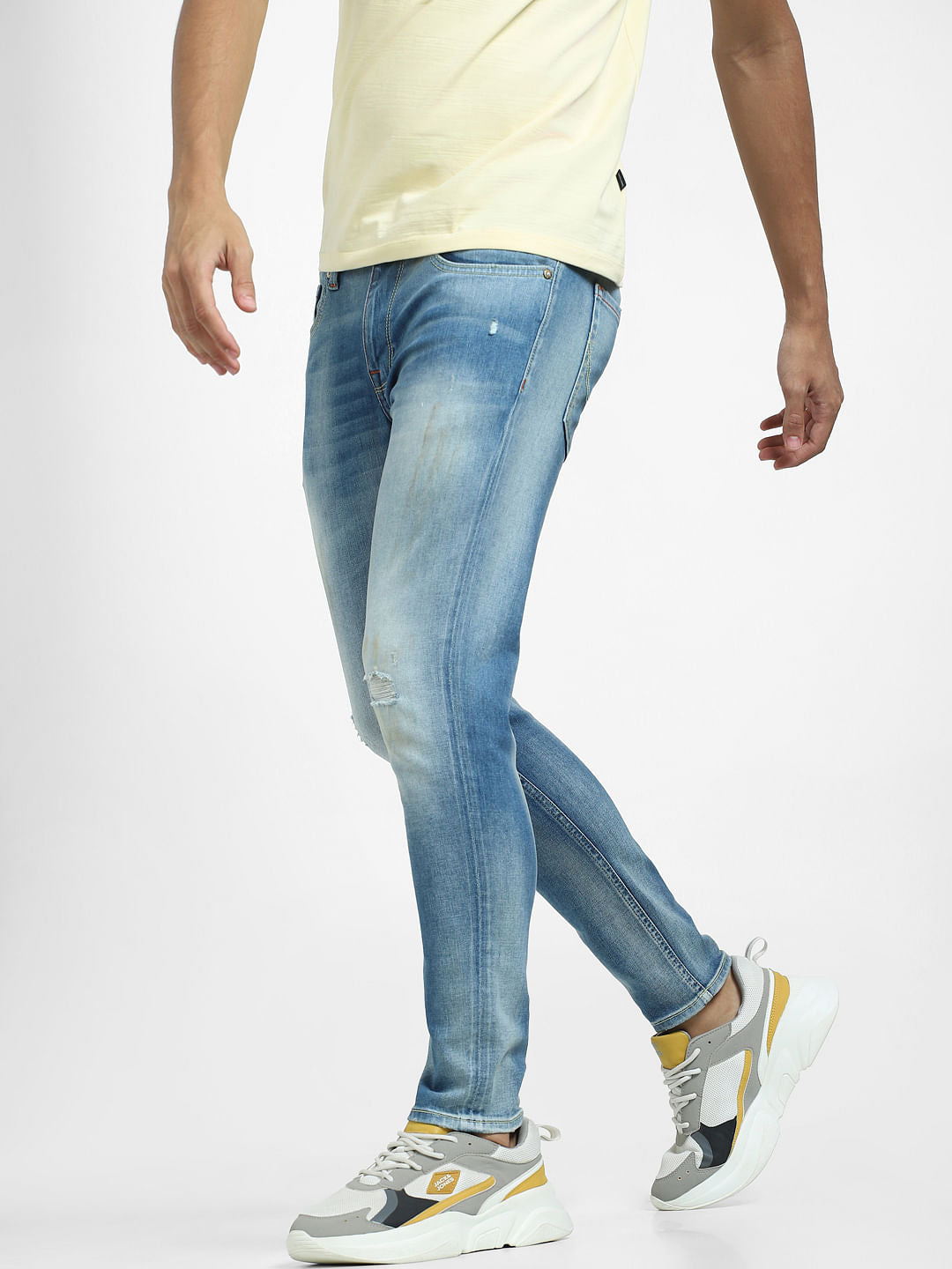 Light Blue Mid Rise Distressed Slim Fit Jeans