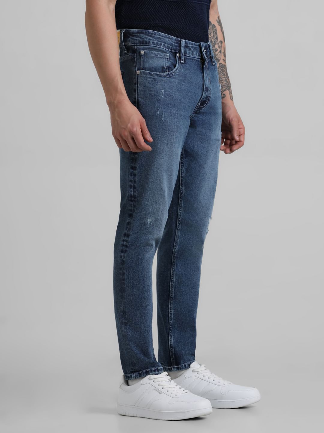 Blue Mid Rise Distressed Brak Slim Jeans
