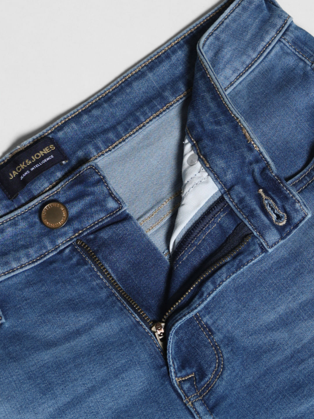 Light Blue Mid Rise Washed Brak Slim Fit Jeans