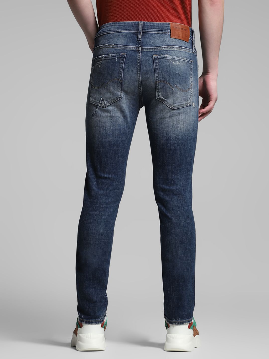 Blue Low Rise Distressed Glenn Slim Fit Jeans