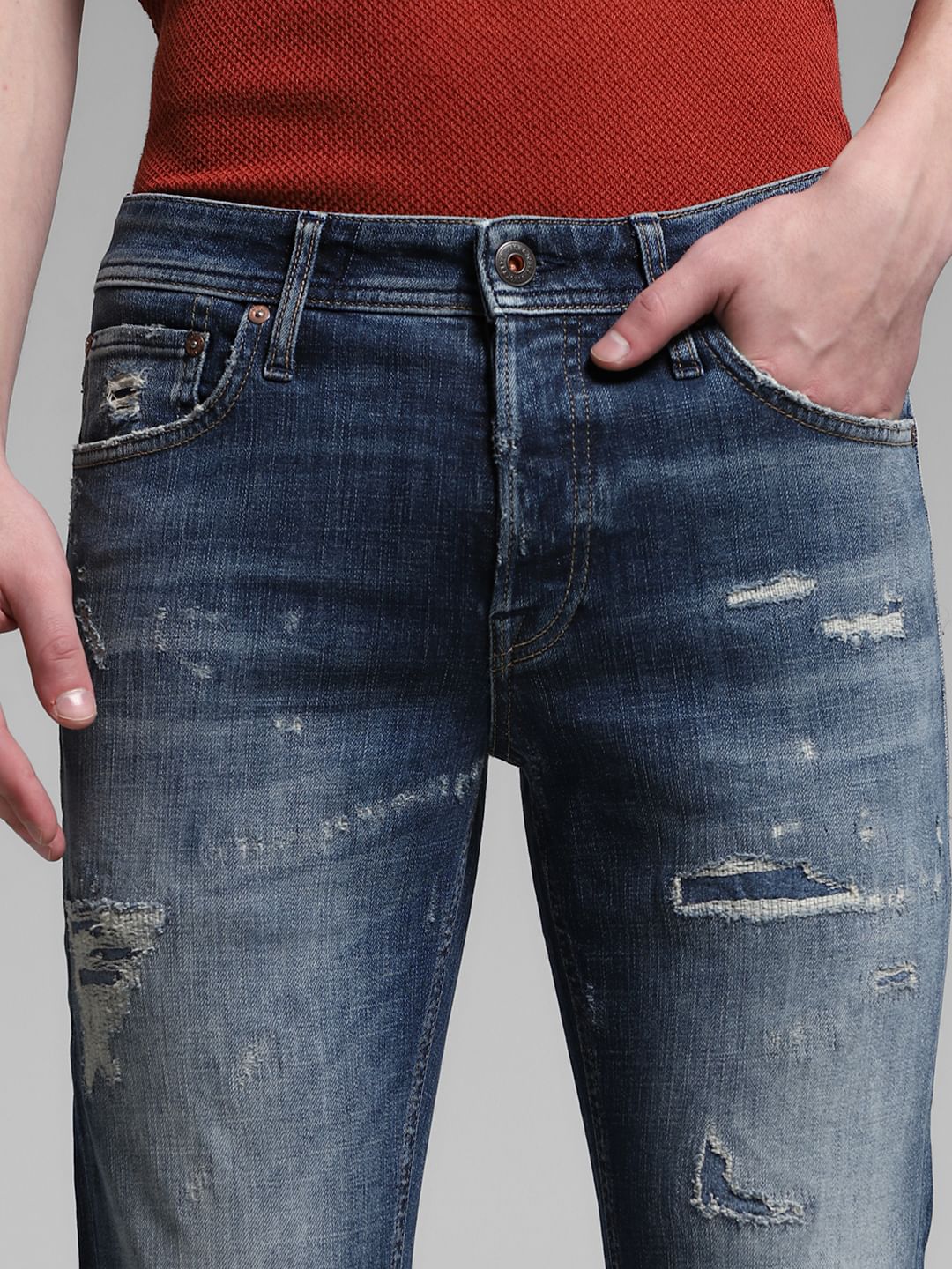 Blue Low Rise Distressed Glenn Slim Fit Jeans