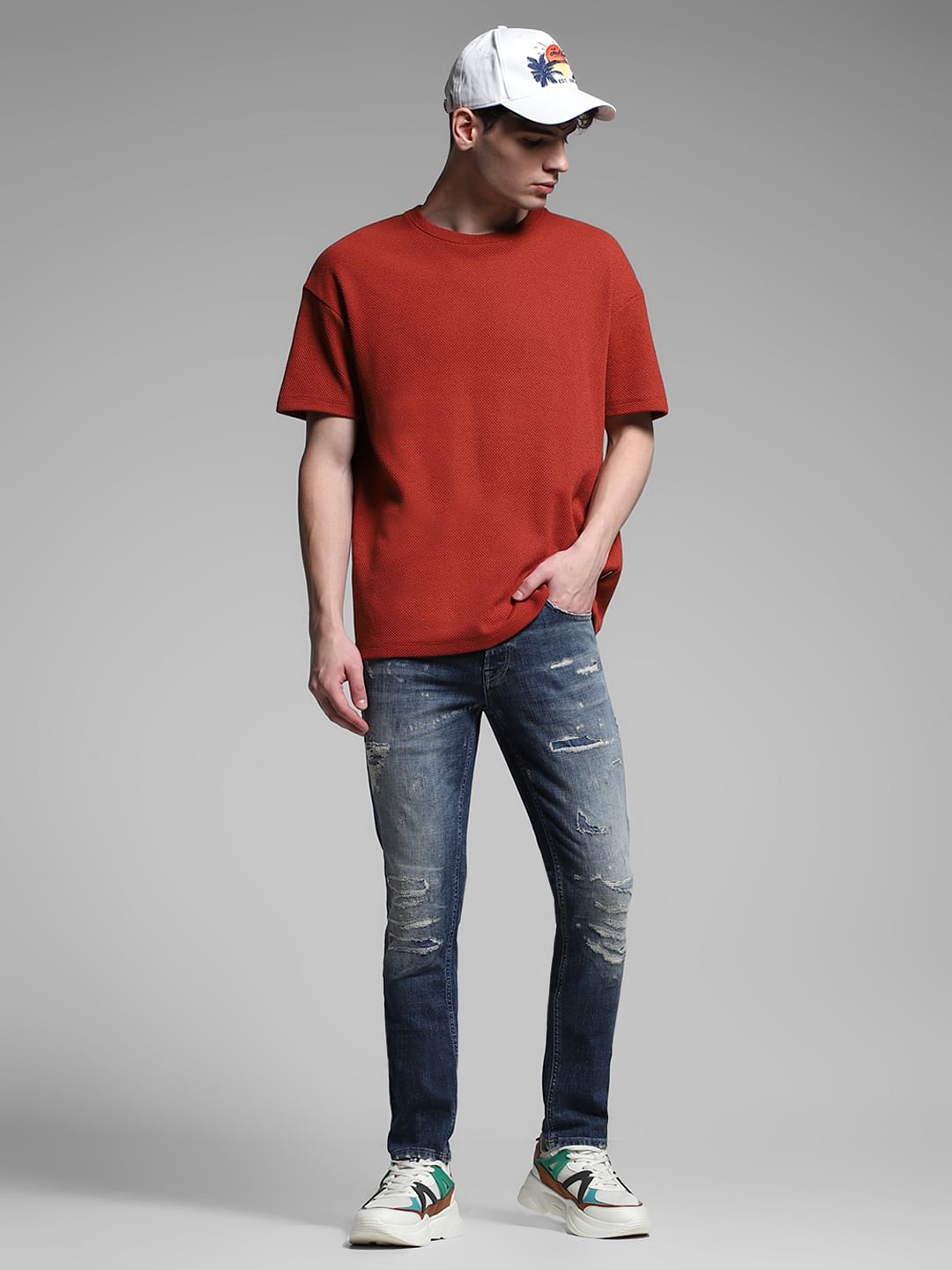 Blue Low Rise Distressed Glenn Slim Fit Jeans