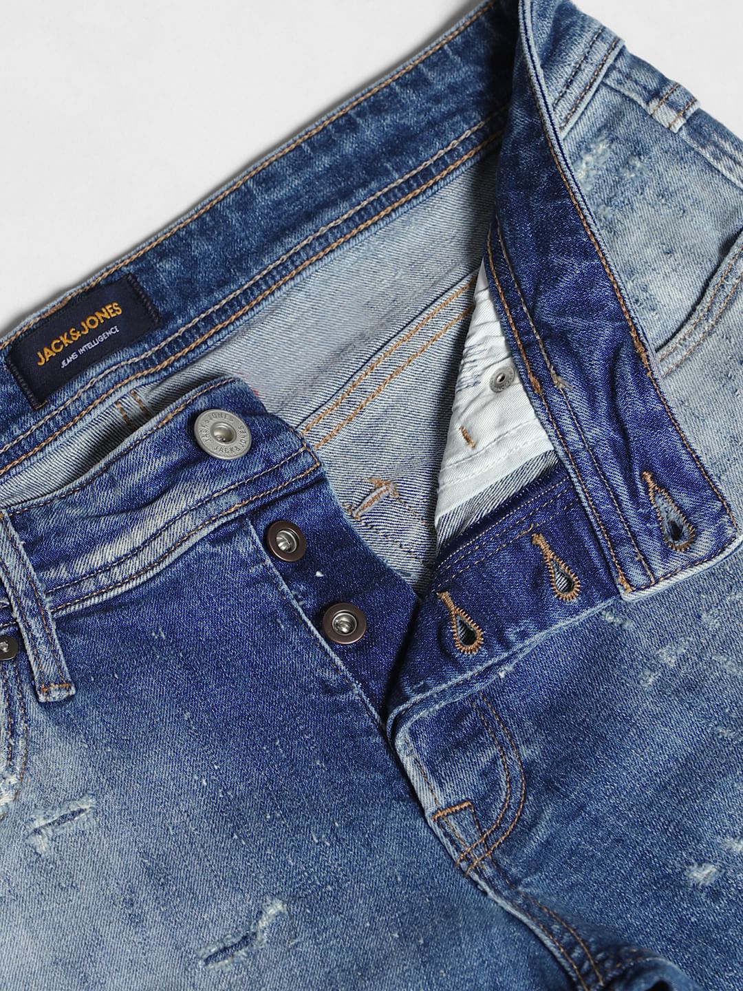 Blue Low Rise Distressed Glenn Slim Fit Jeans