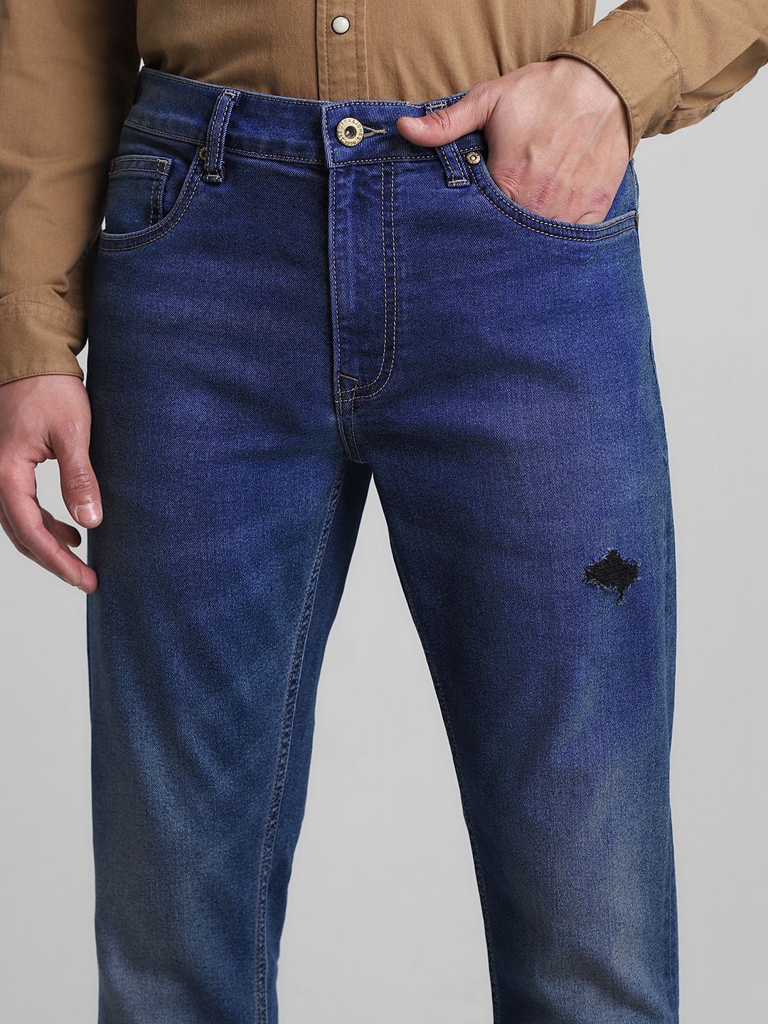 Blue Low Rise Distressed Ben Skinny Jeans