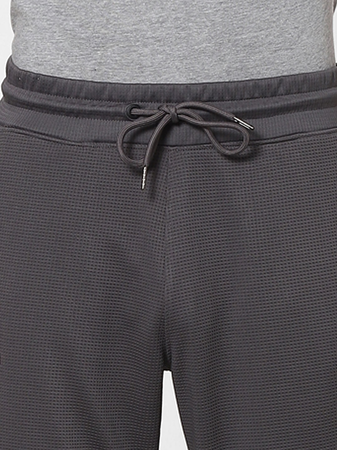 Grey Mid Rise Self Design Sweatpants