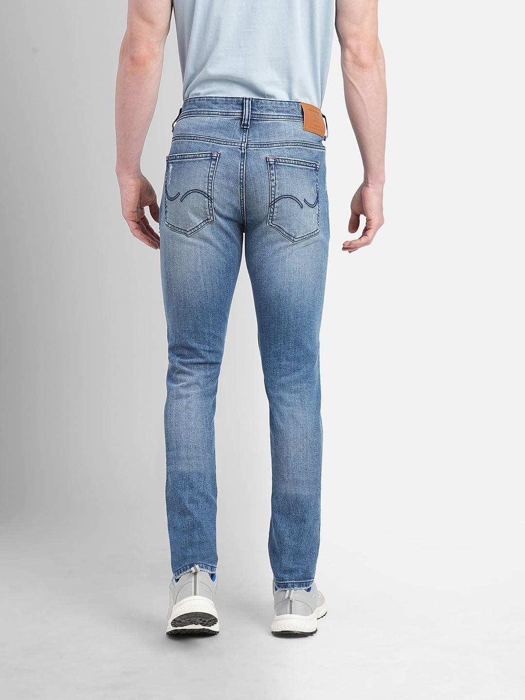 Blue Low Rise Distressed Liam Skinny Jeans