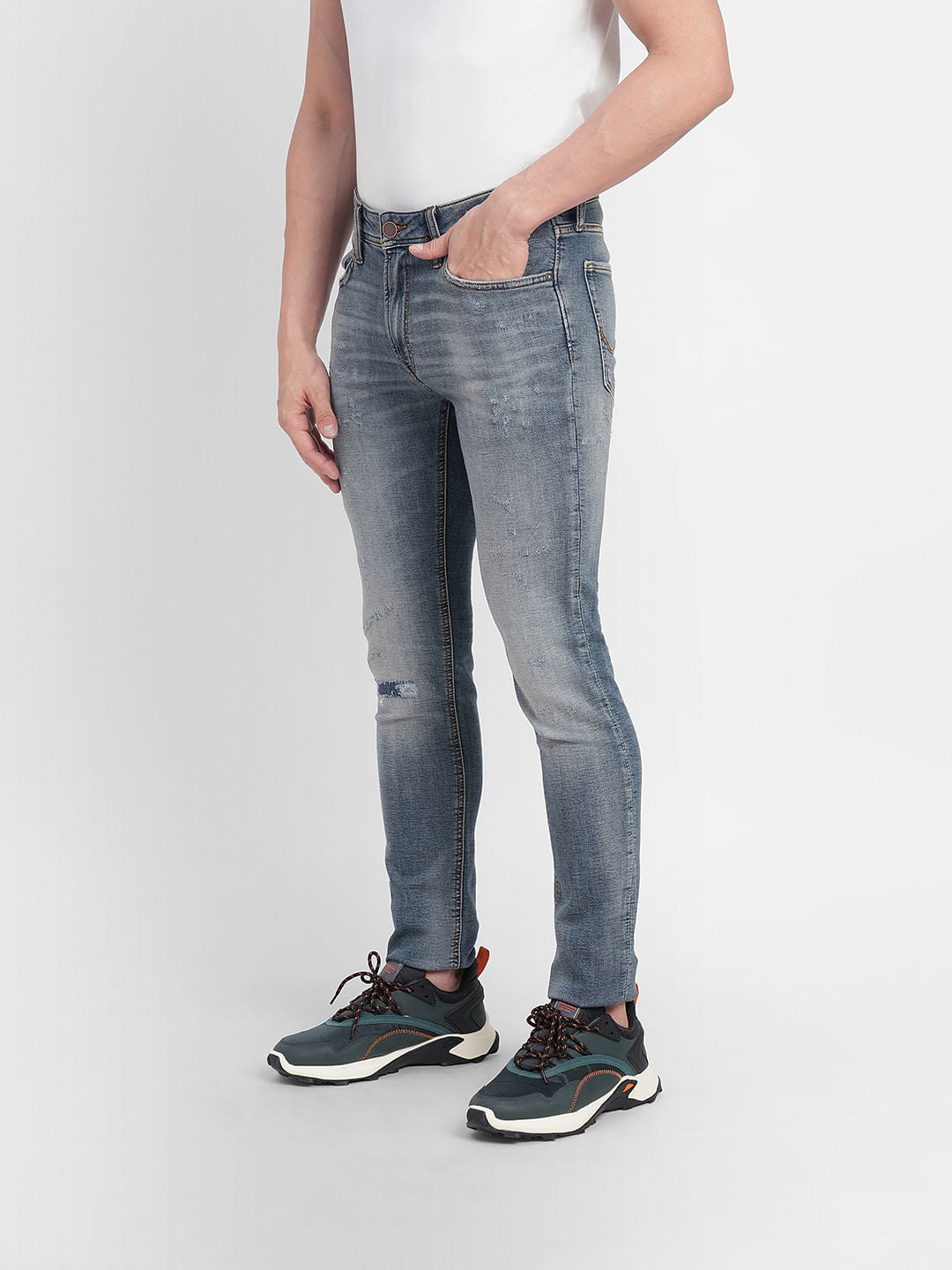Blue Low Rise Distressed Ben Skinny Jeans