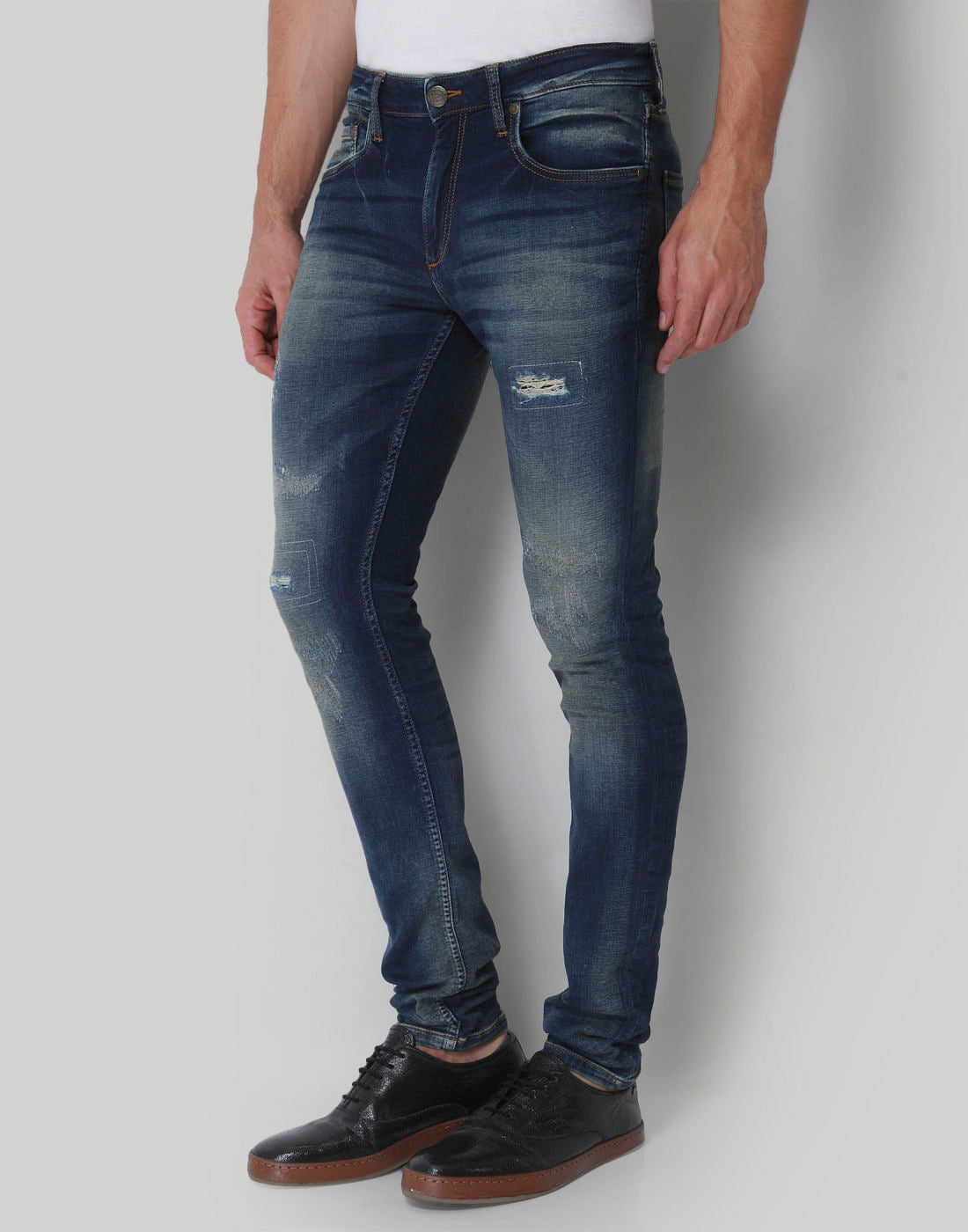 Blue Low Rise Distressed Liam Slim Fit Jeans