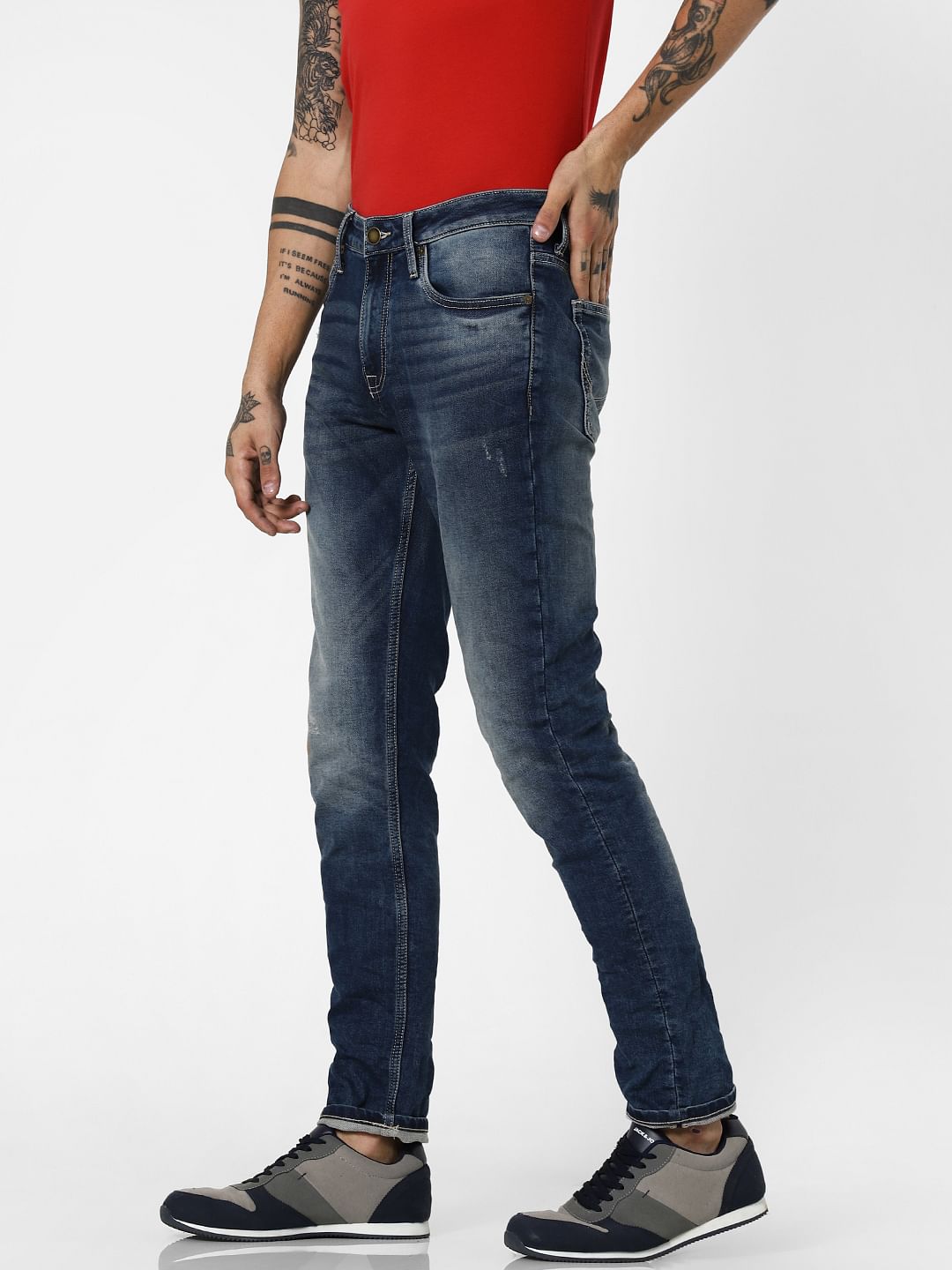 Blue Low Rise Indigo Knit Ben Skinny Jeans