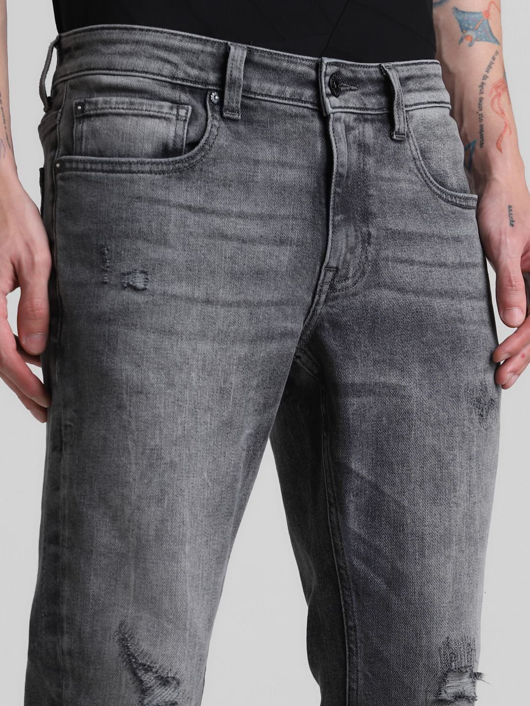 Grey Mid Rise Distressed Brak Slim Jeans