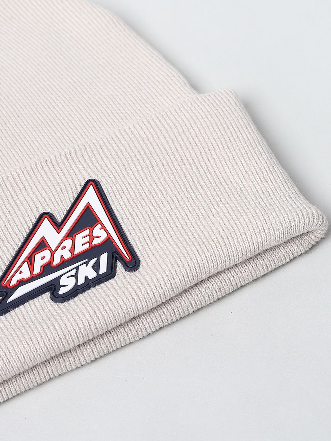 BEIGE GRAPHIC PRINT BEANIE