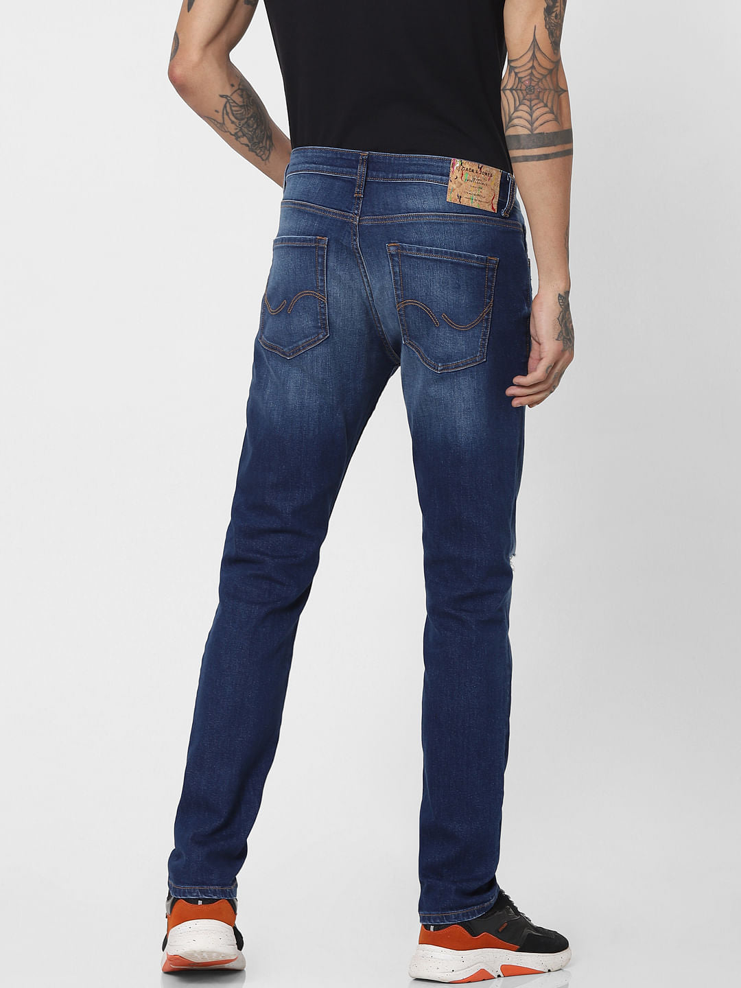 Blue Mid Rise Ripped Slim Jeans