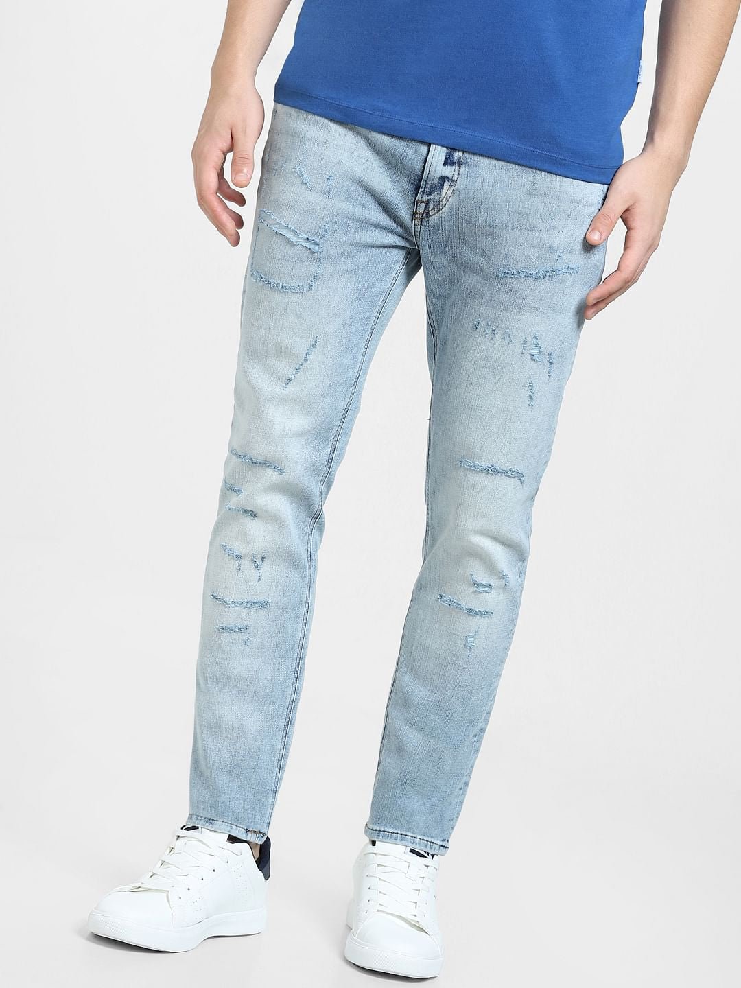 Blue Low Rise Distressed Liam Skinny Jeans