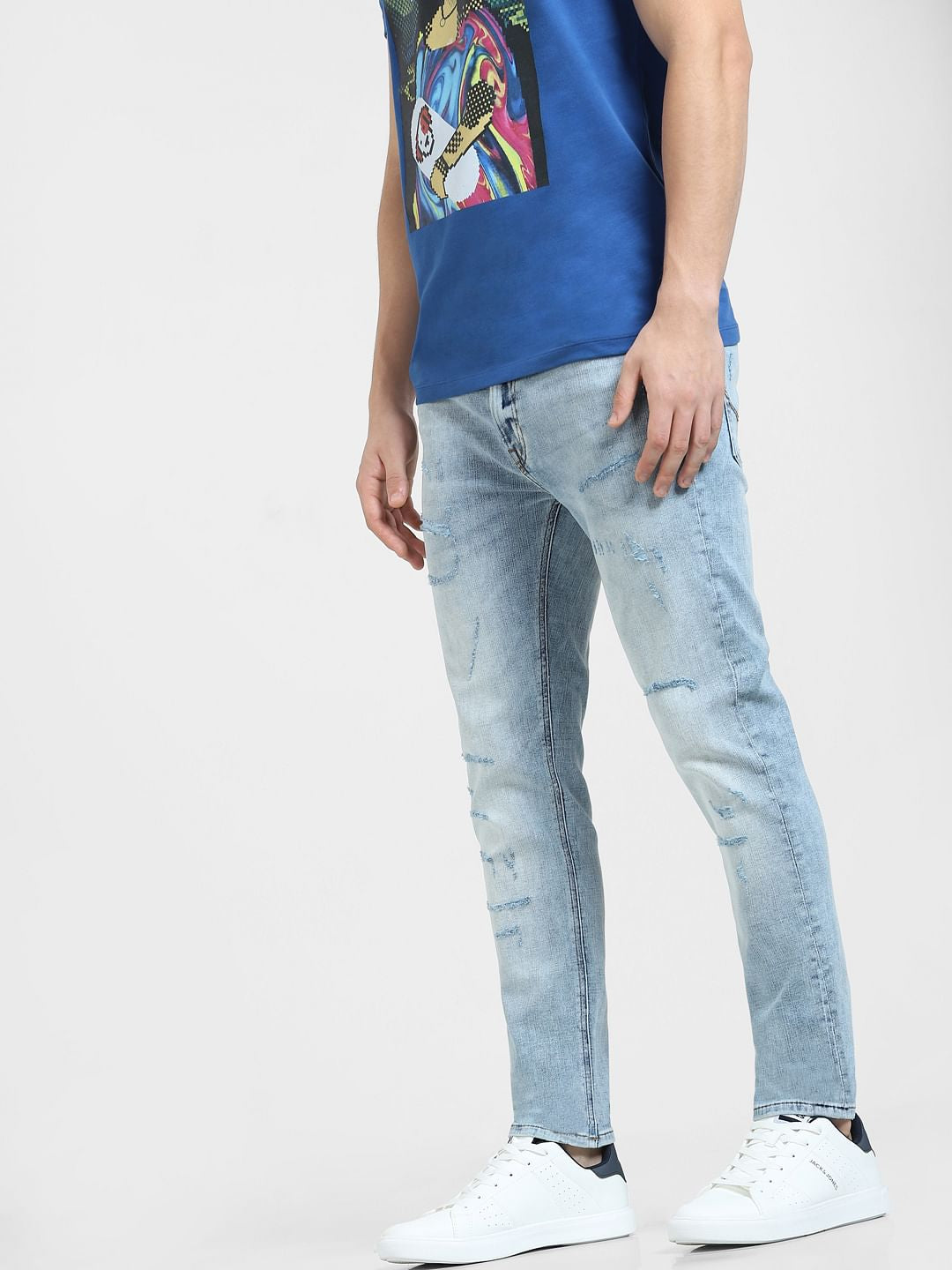 Blue Low Rise Distressed Liam Skinny Jeans