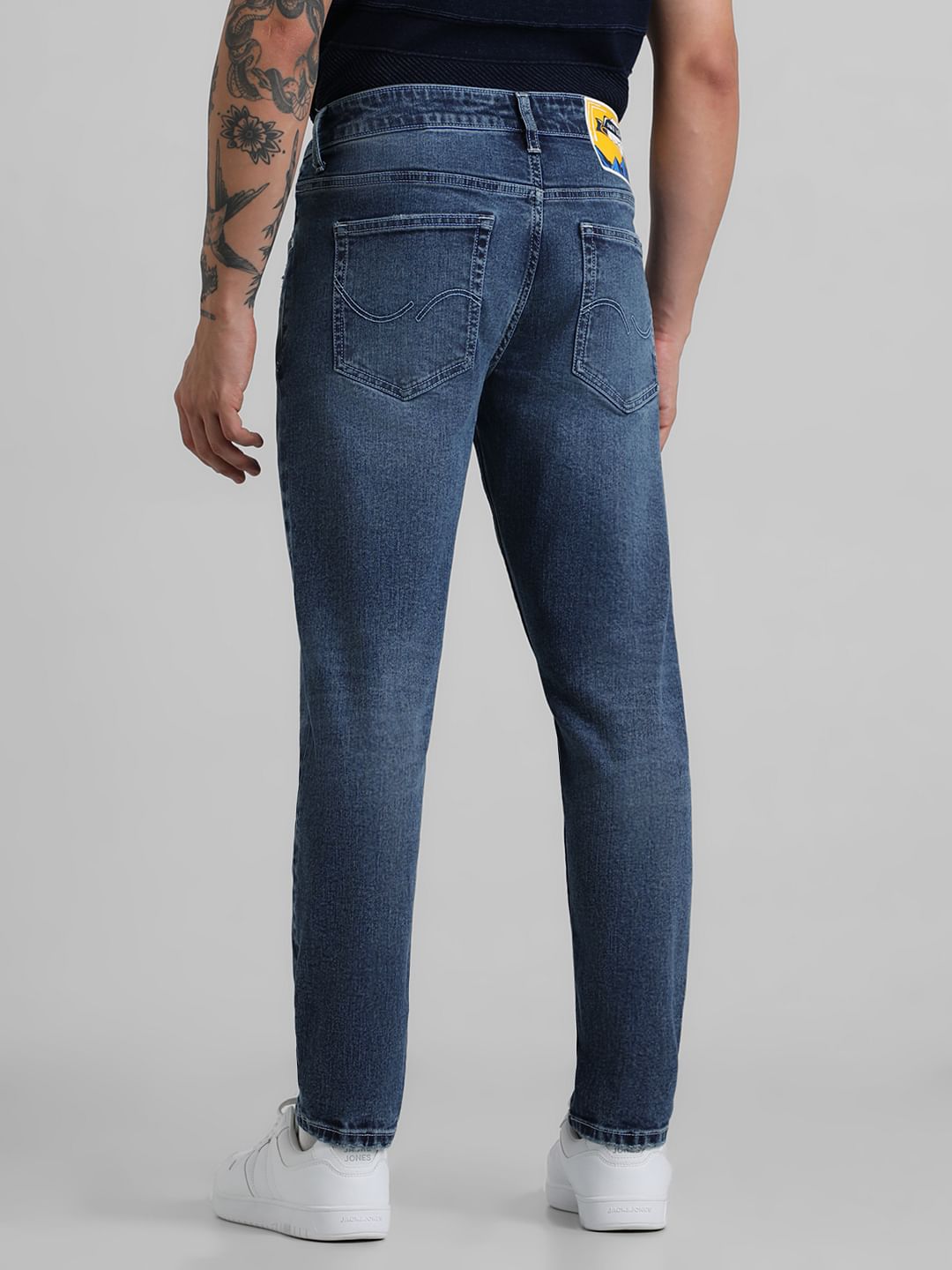 Blue Mid Rise Distressed Brak Slim Jeans