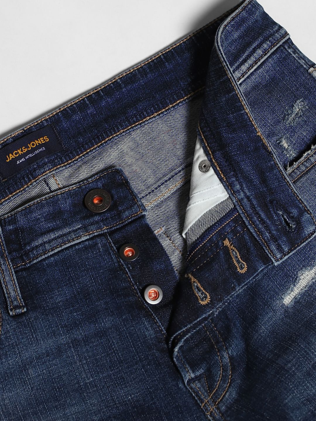 Blue Low Rise Distressed Glenn Slim Fit Jeans