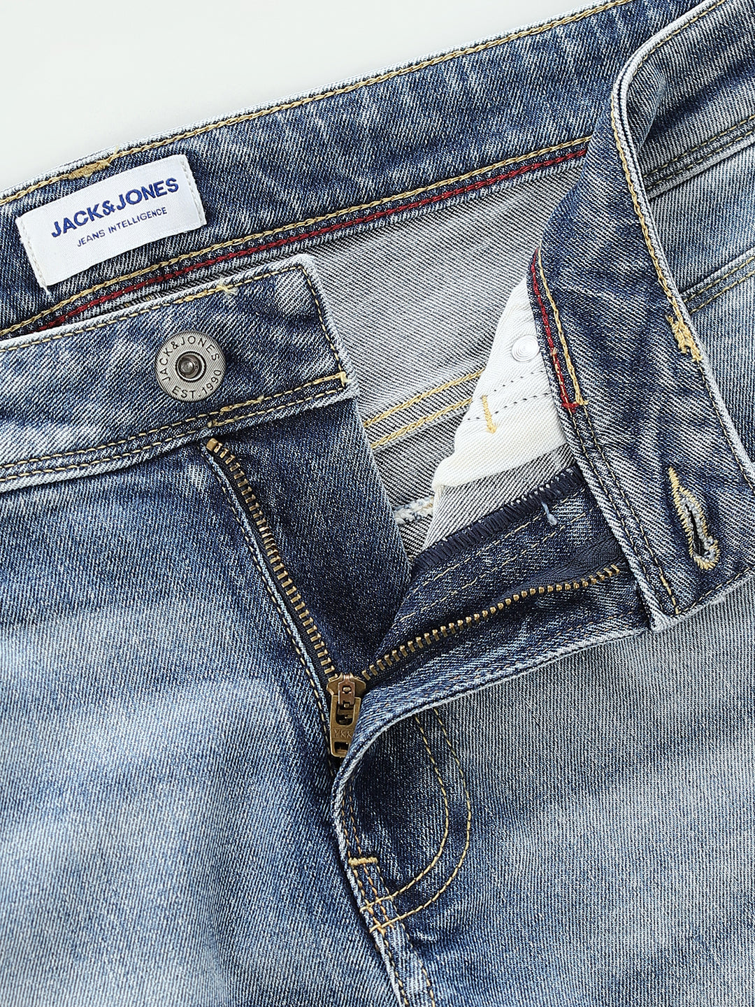 Mildly Distressed 5 Pocket Slim Fit Jeans